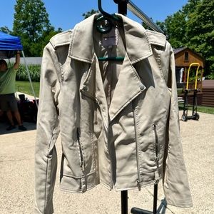 Cream leather jacket. Barley worn